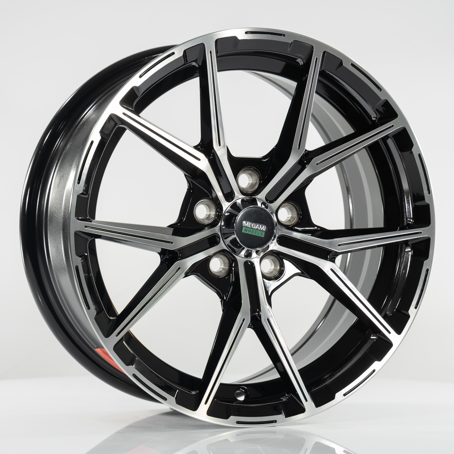 Megami MGM-22 6.5J x 15 5x100 ET38 DIA57.10