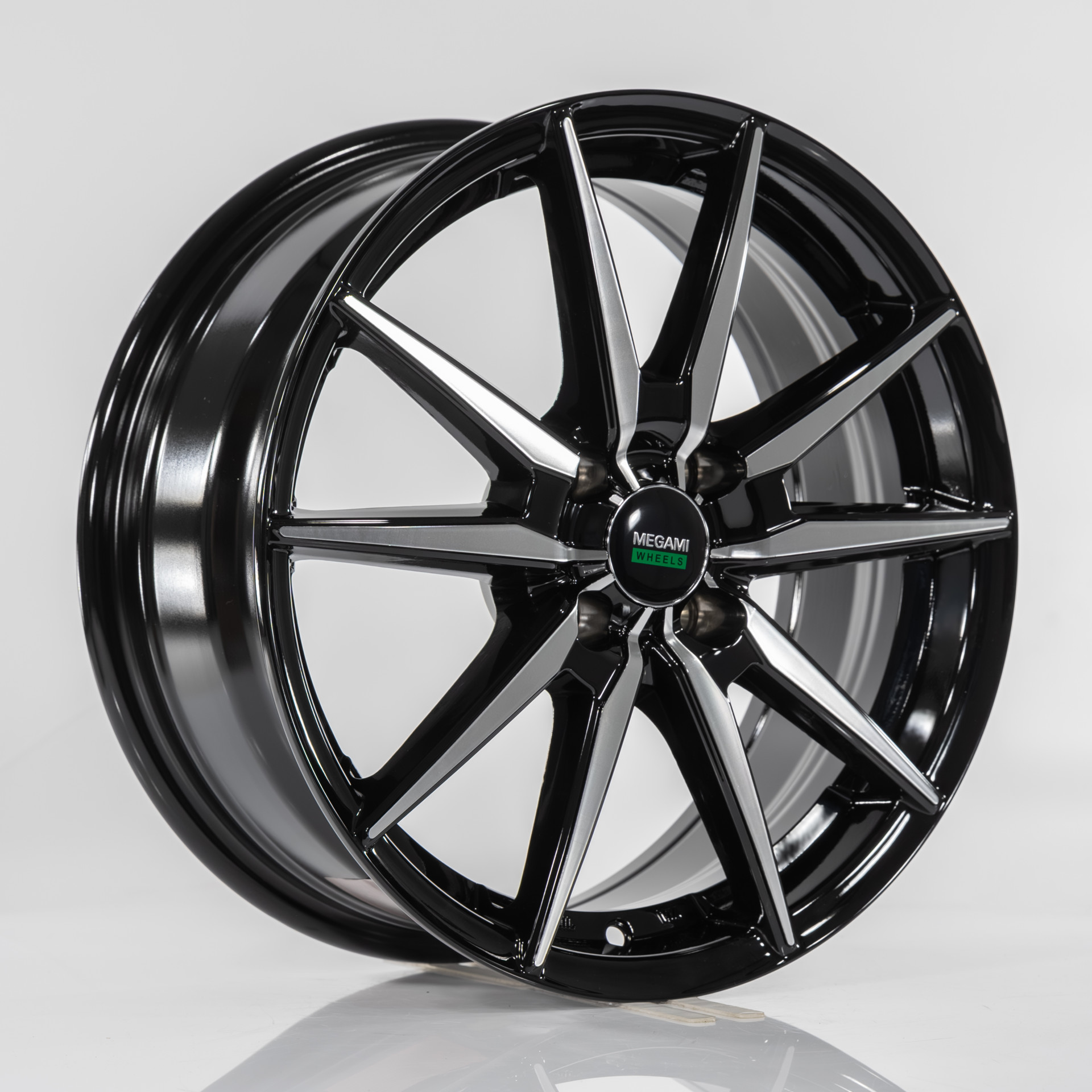 Megami MGM-40 7J x 17 4x100 ET38 DIA60.10